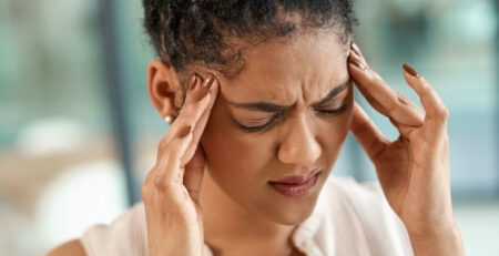 person suffering from headache